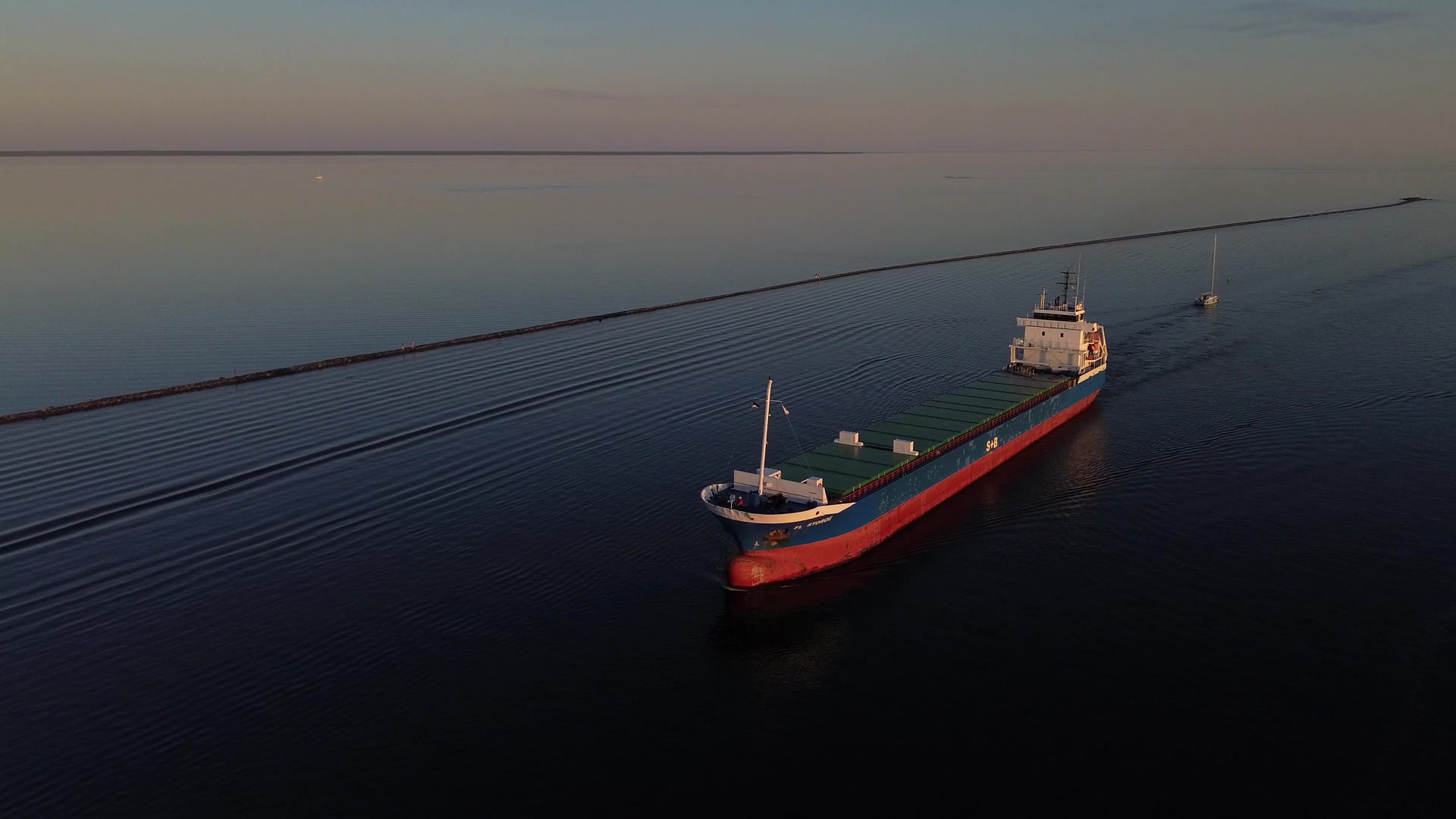 Bulk carrier under way on calm open water